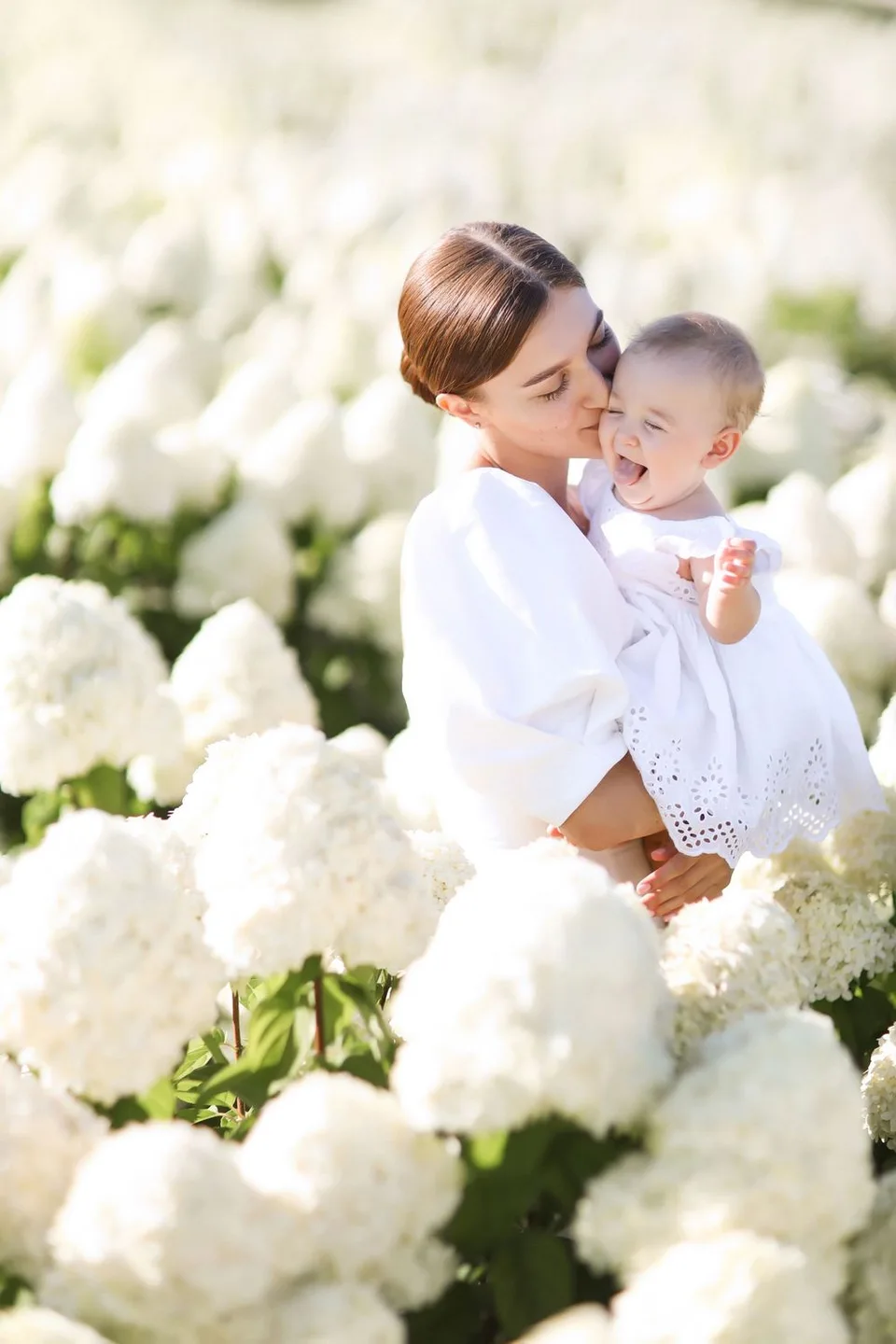 Mother holding her baby