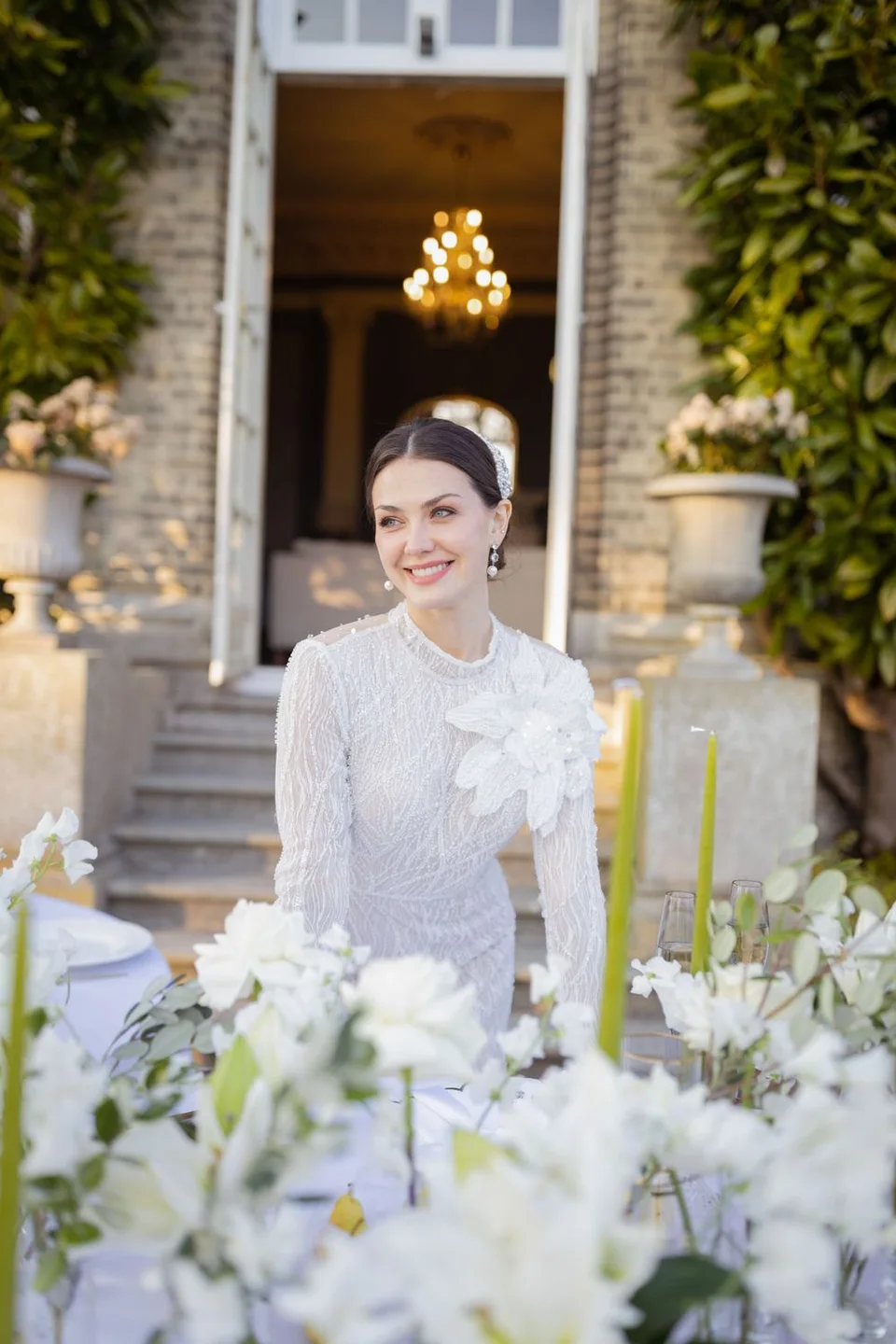 Stunning bridal portrait taken in a beautiful garden setting in Sussex, highlighting the elegance and beauty of the bride.