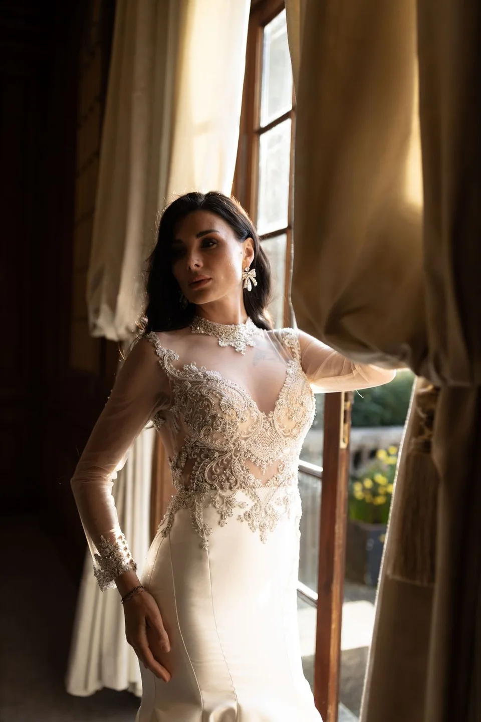 Bridal portrait taken at sunset in Kent, highlighting the elegance and beauty of the bride in her wedding gown.