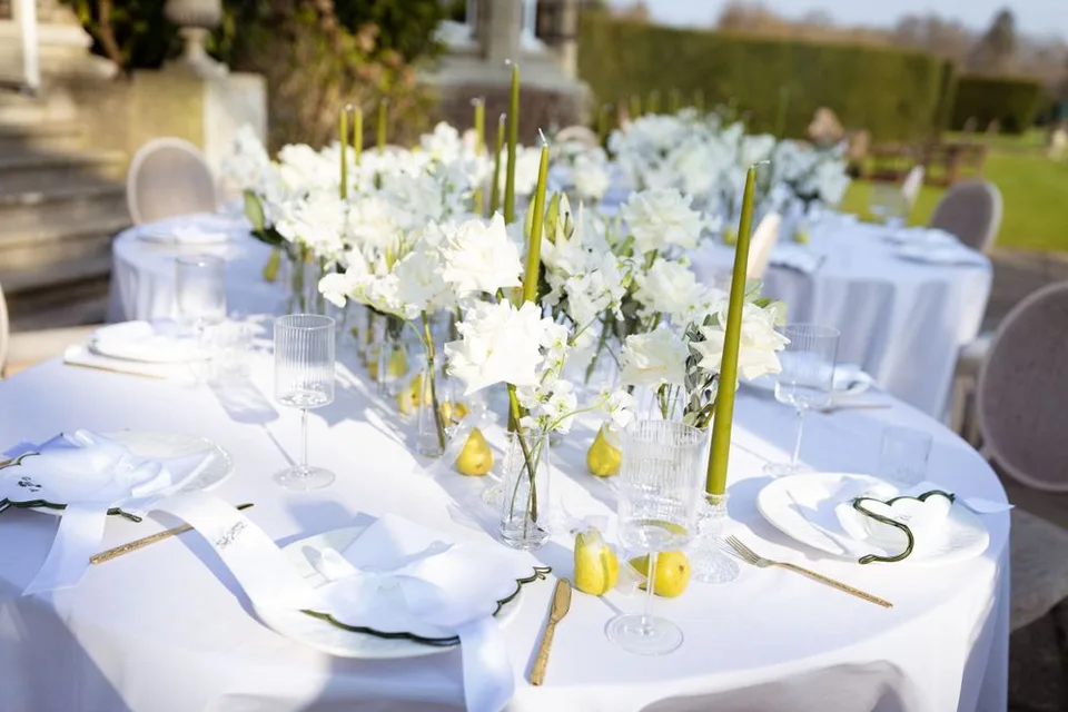 Beautifully arranged floral centrepieces at the wedding reception in East Sussex, enhancing the romantic ambiance.
