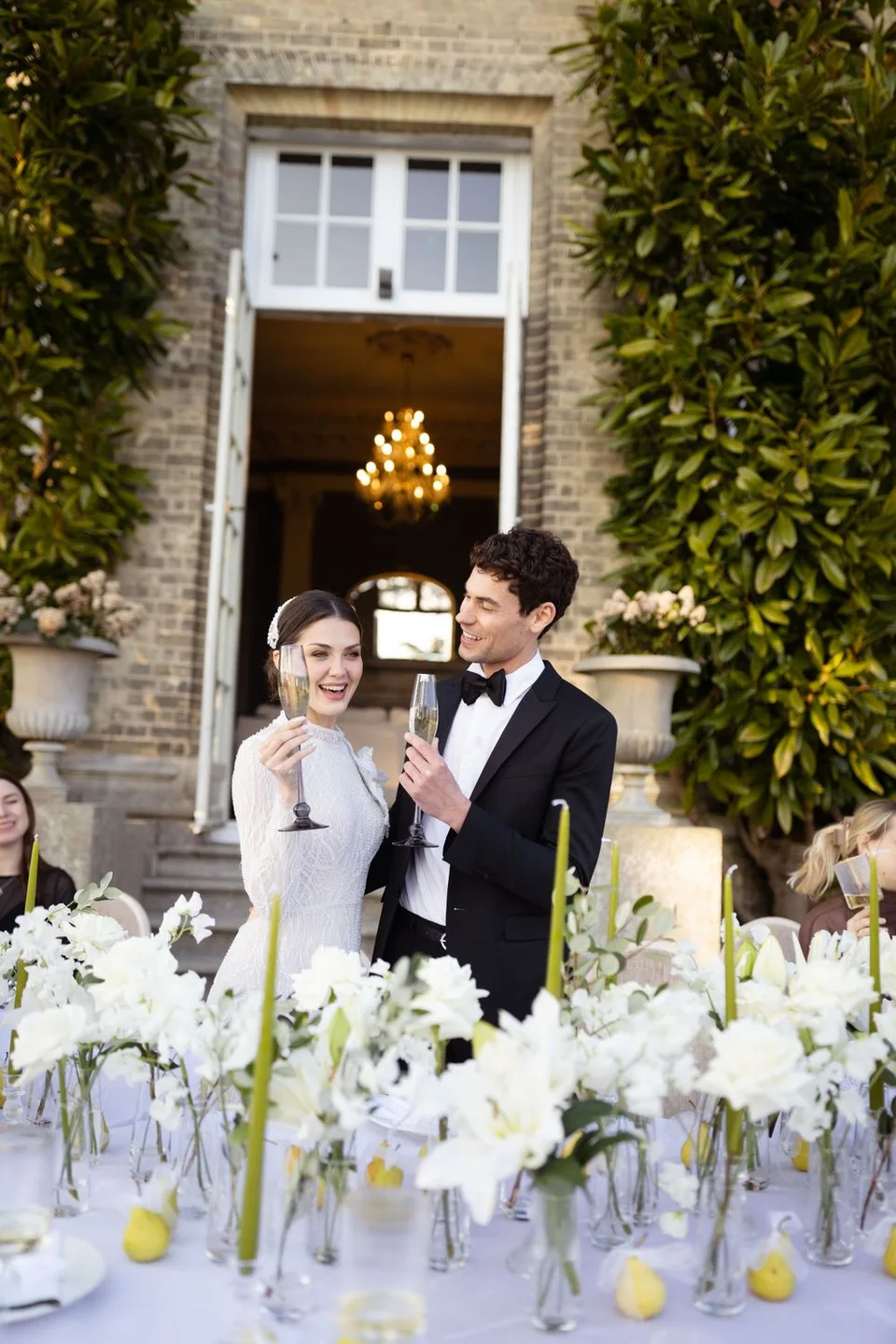 Intimate wedding reception in a charming venue in West Sussex, showcasing elegant decor and joyful celebrations among guests