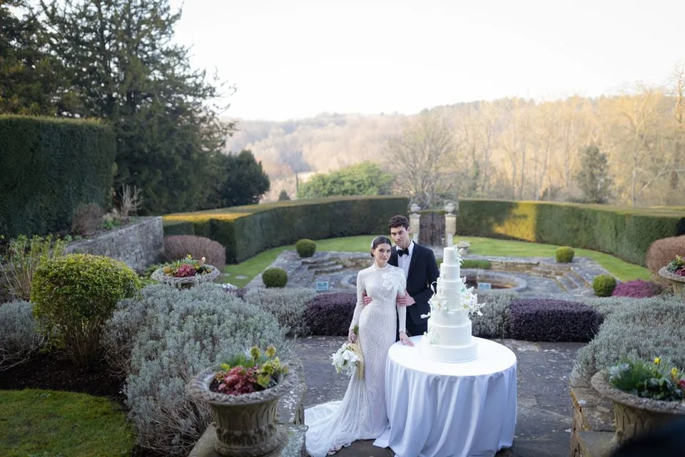 Stunning outdoor wedding setup featuring floral arrangements and decorations in East Sussex, perfect for a fairytale celebration.