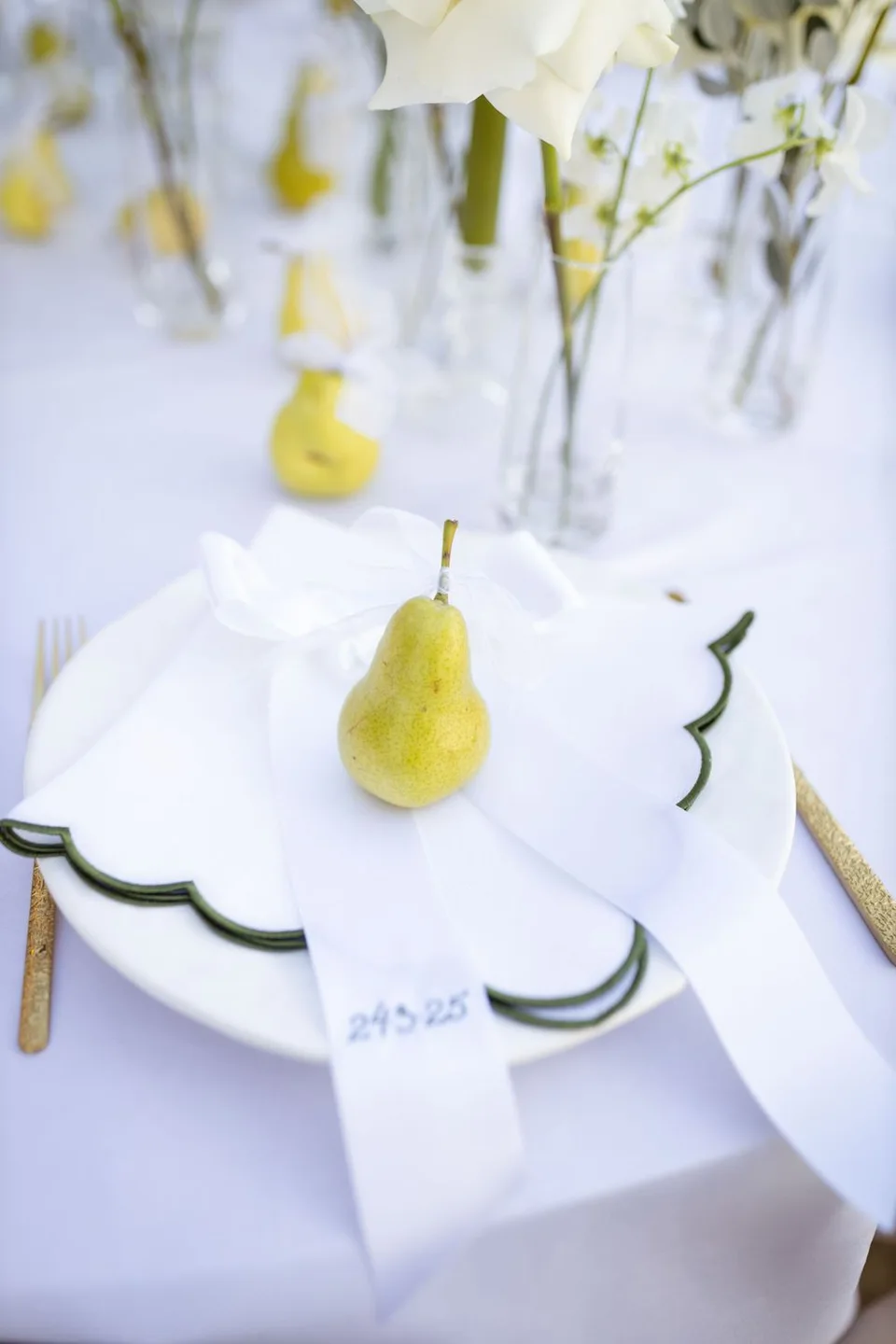 Beautifully arranged floral centrepieces at the wedding reception in East Sussex, enhancing the romantic ambiance.