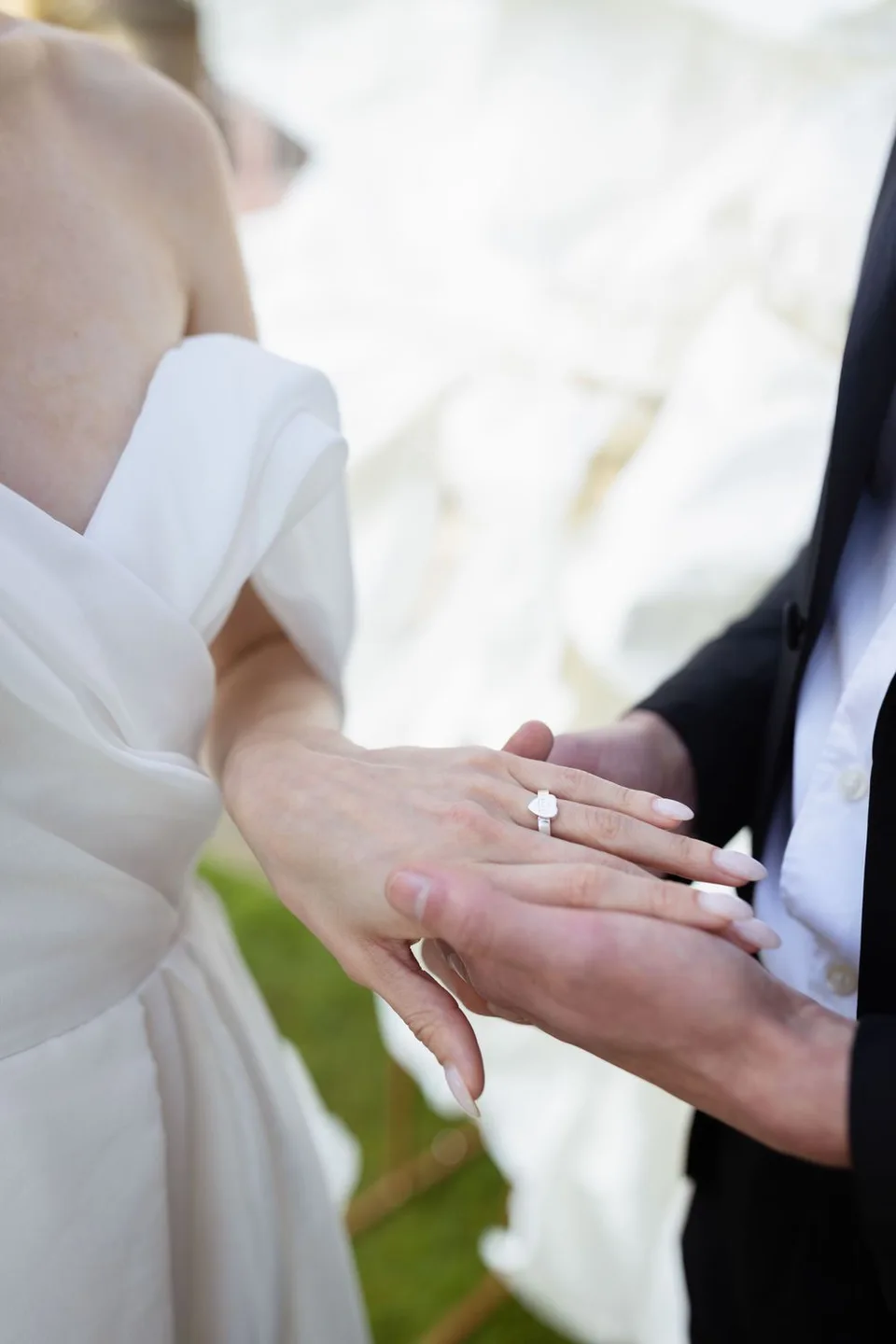 Stunning wedding rings displayed on an elegant fabric background, symbolising the couple's love and commitment.