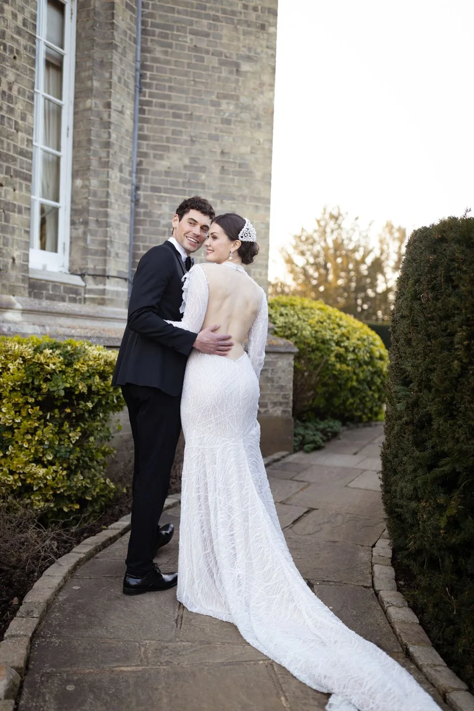 Intimate wedding reception in a charming venue in West Sussex, showcasing elegant decor and joyful celebrations among guests.