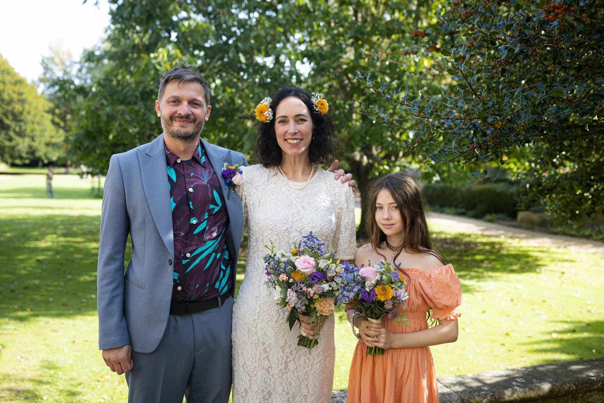 Family photographs in the gardens after the ceremony