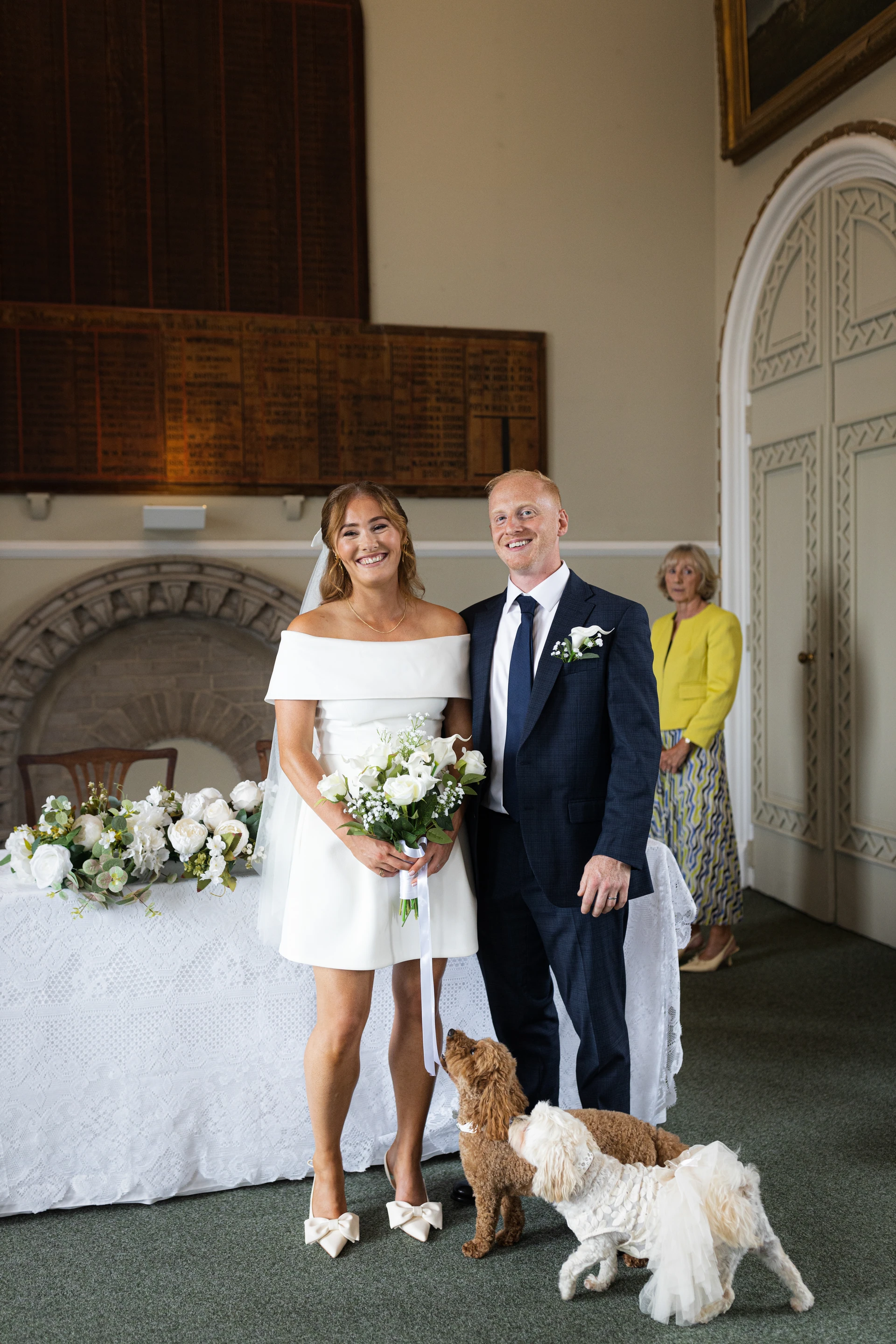 Their dogs joining the wedding celebrations