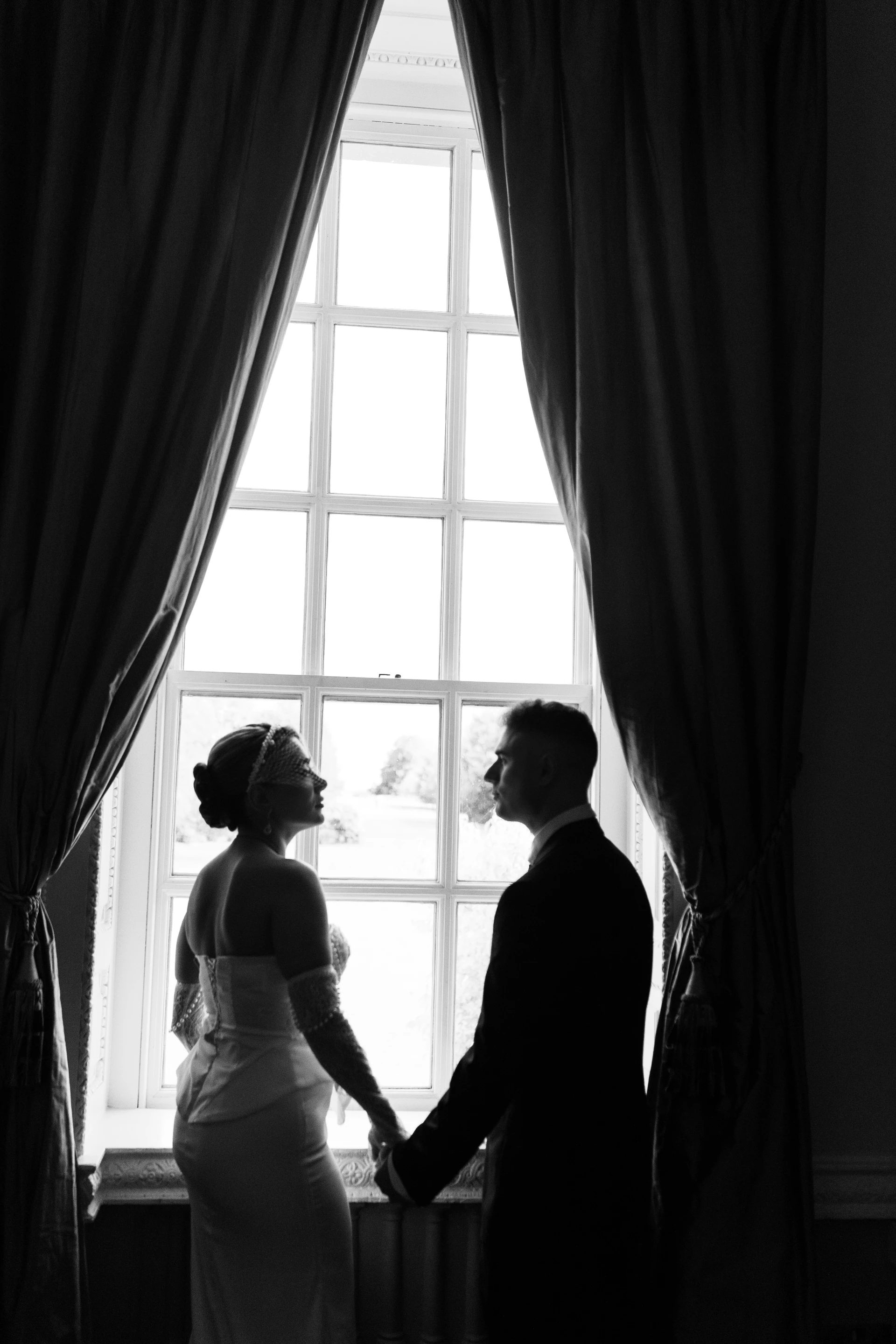 A silhouette in the window light