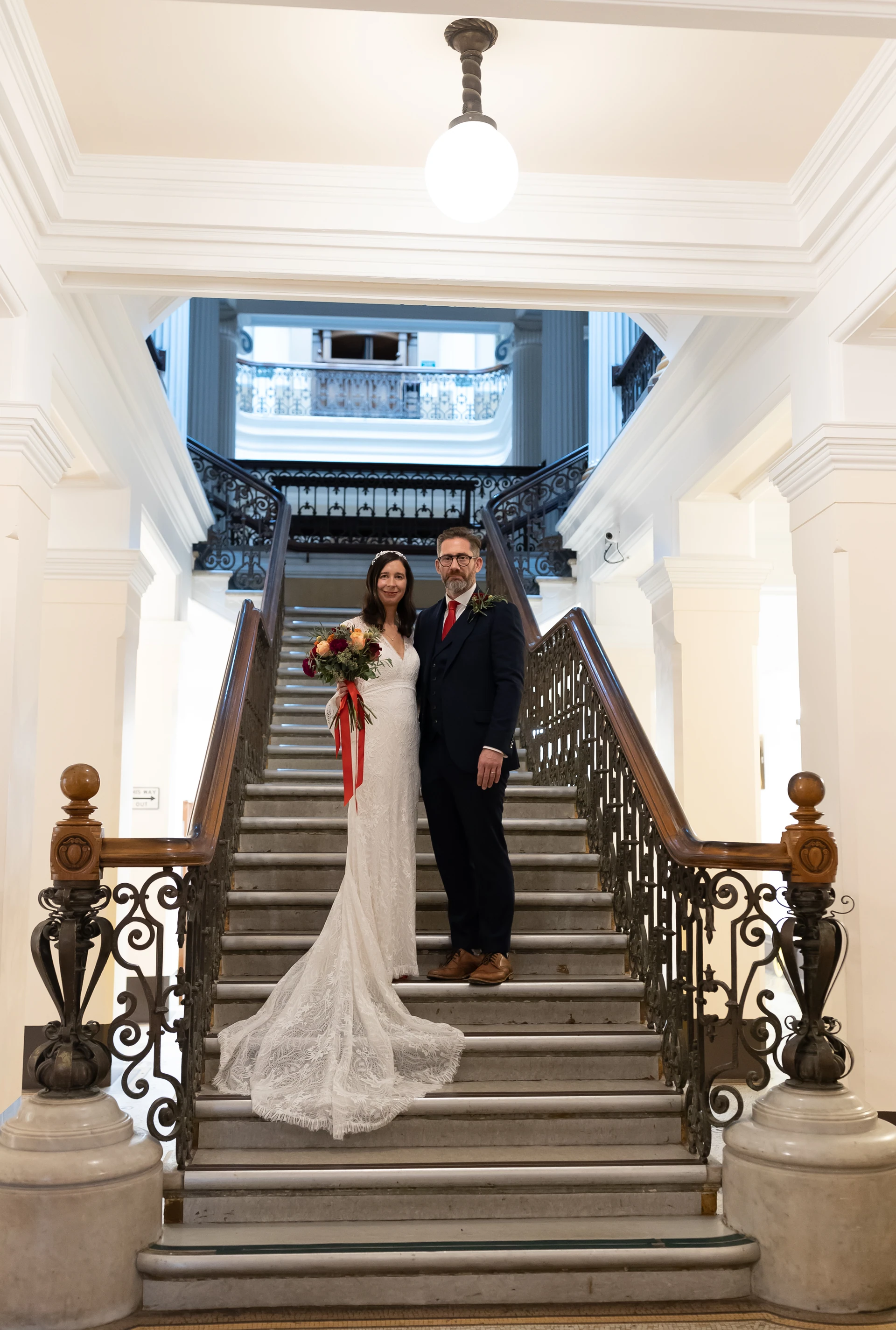 Newlywed portraits on the Town Hall staircase