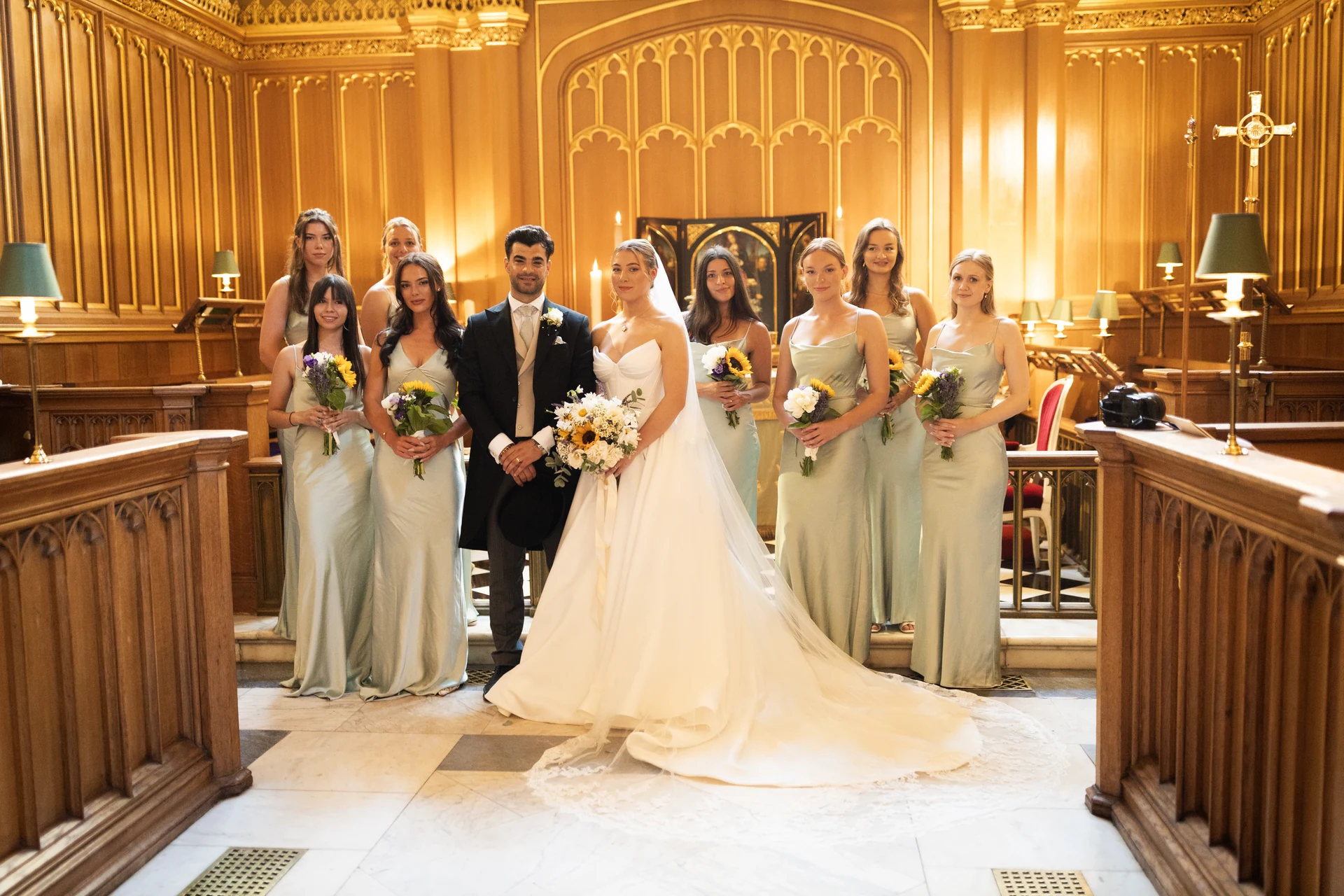 Natalia and Amir with their wedding party in the chapel